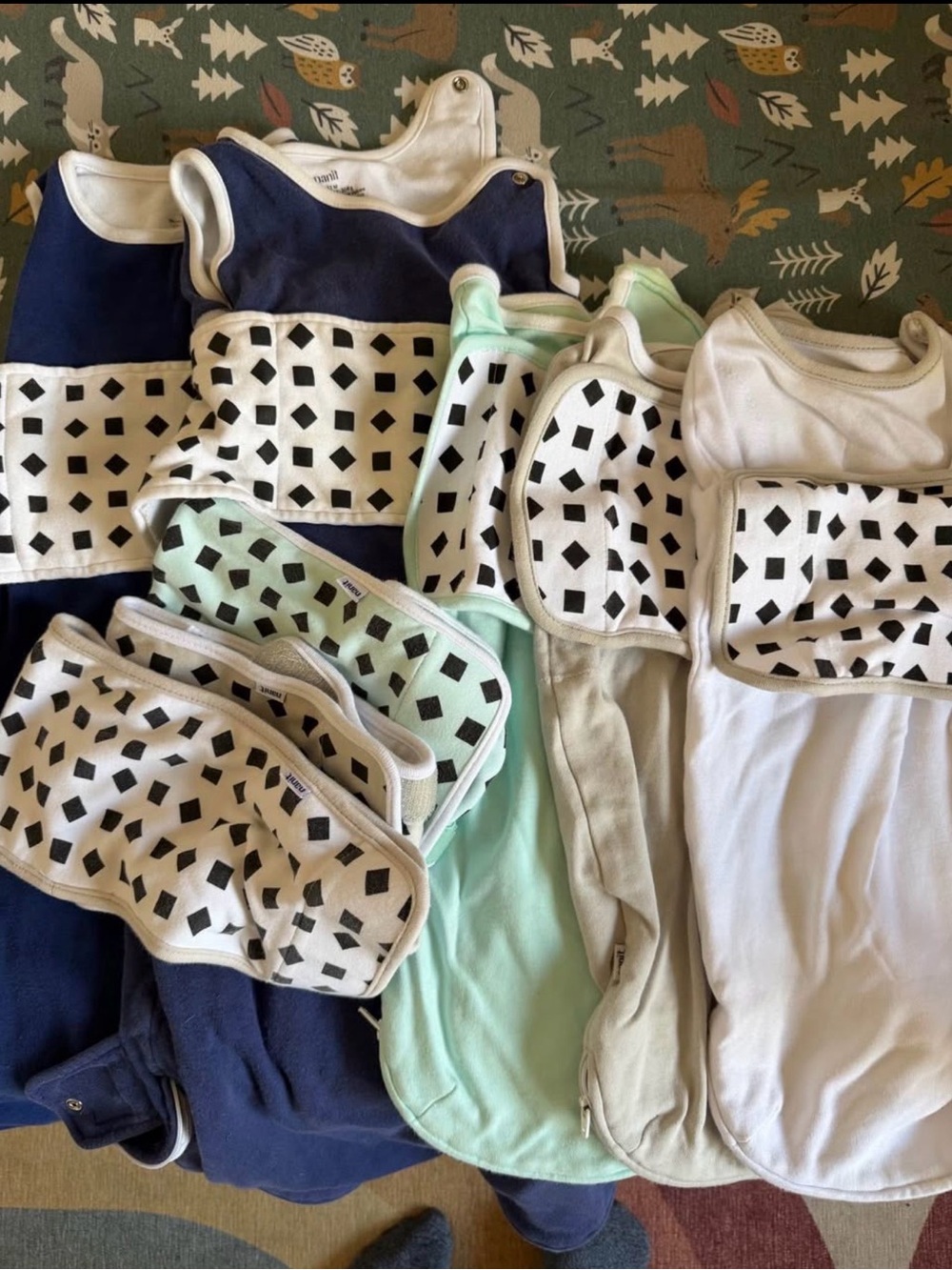 5 Nanit Baby Sleep Sacks and 3 sleep bands